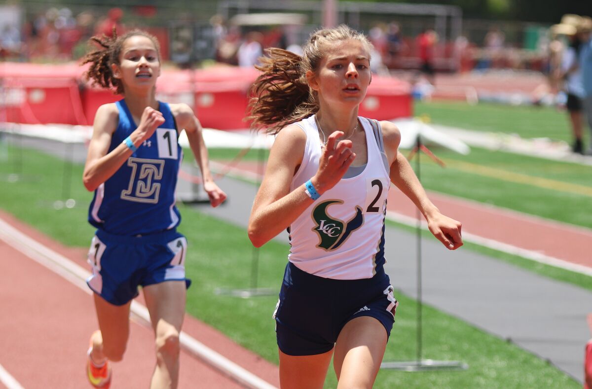 LCC junior Gioana Lopizzo, here finishing up the 3,200, was a two-event winner.