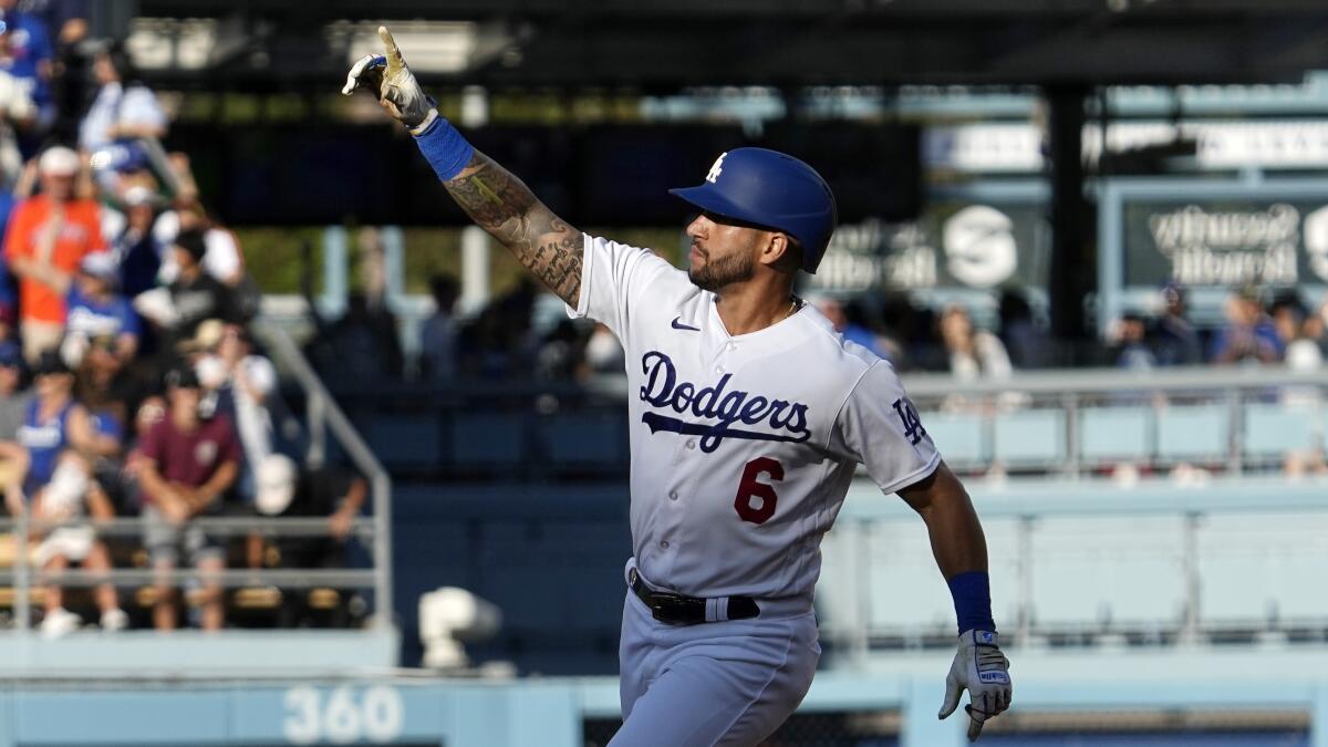 Dodgers rally from 4-run deficit to beat Astros 8-7 on game