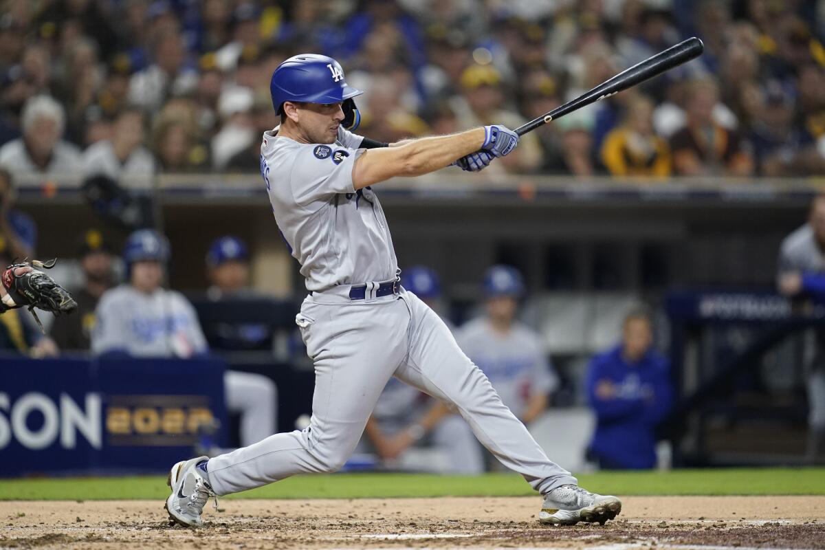 Dodgers catcher Austin Barnes hits a single in the third inning.