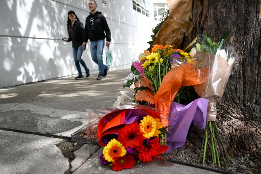 SAN FRANCISCO, CA - APRIL 7: Flowers and cards left as people paying tribute to Bob Lee near the Portside apartment building in San Francisco, California, United States on April 7, 2023. Bob Lee, the American technology entrepreneur who cofounded Cash App, the mobile payment service provider, was stabbed to death in the US city of San Francisco on Wednesday. (Photo by Tayfun Coskun/Anadolu Agency via Getty Images)