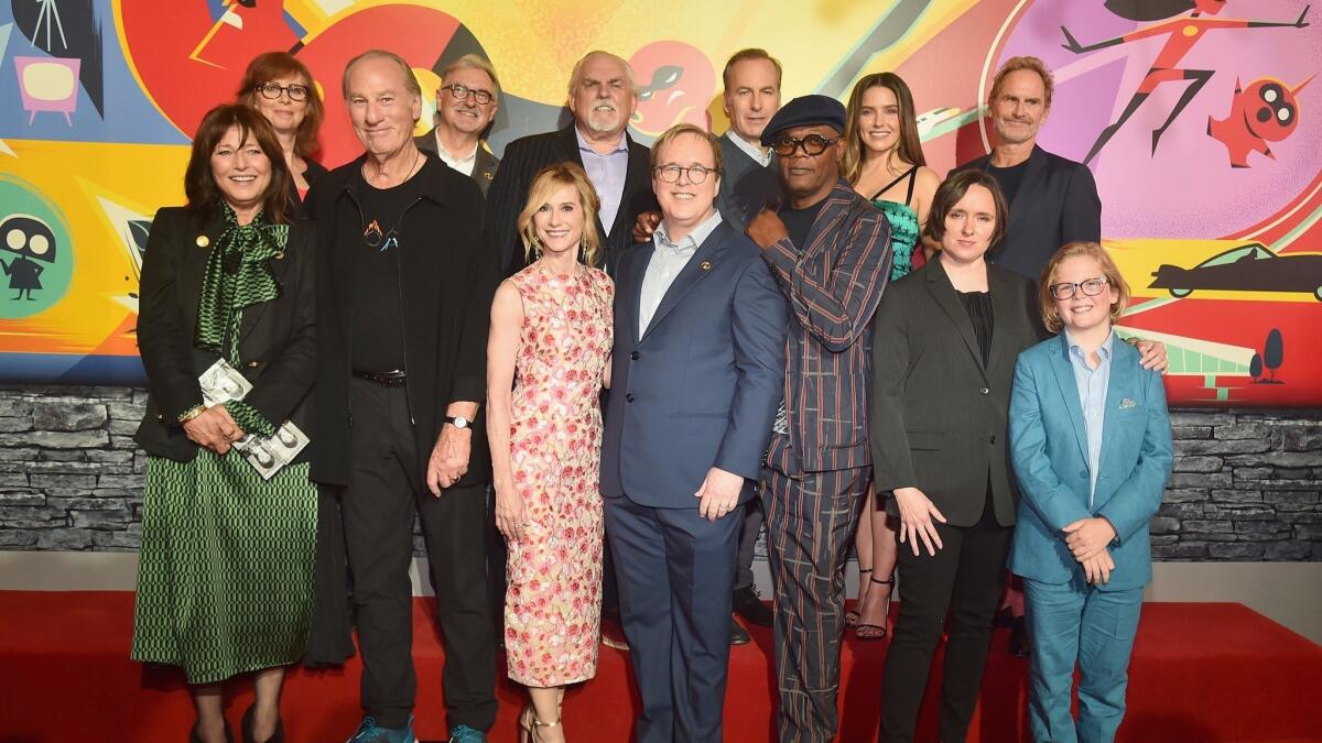 Back row, from left, Nicole Paradis Grindle, John Walker, John Ratzenberger, Bob Odenkirk, Sophia Bush, Jere Burns; front row, from left, Catherine Keener, Craig T. Nelson, Holly Hunter, Brad Bird, Samuel L. Jackson, Sarah Vowell, and Huck Milner