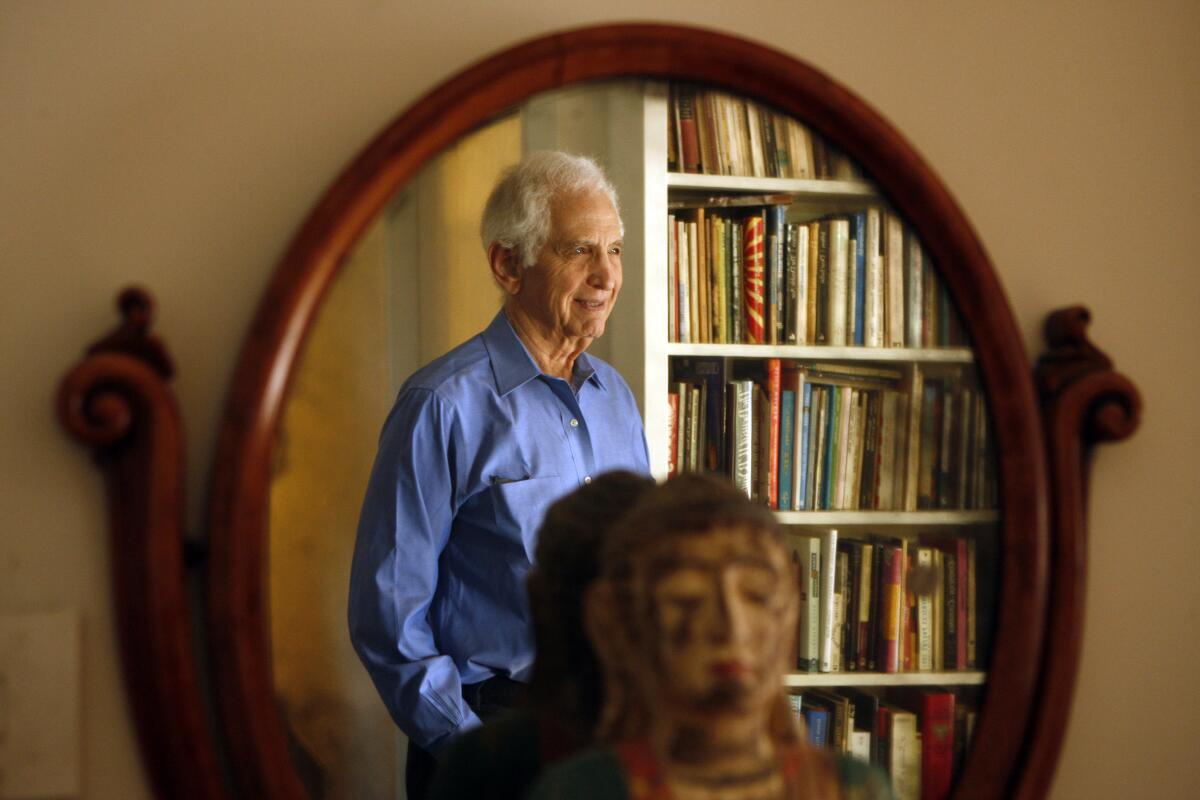  Dr. Daniel Ellsberg, the man behind the release of the Pentagon Papers is reflected in a mirror 