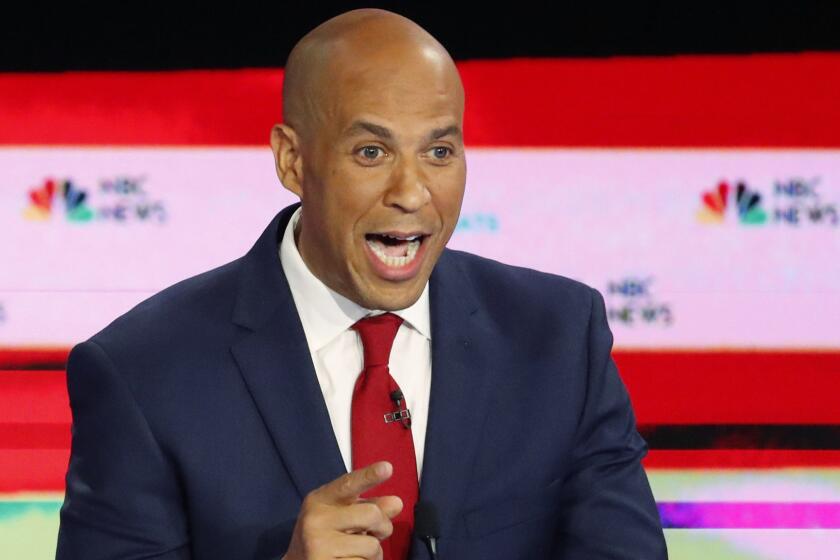 In this June 26, 2019 photo, Democratic presidential candidate Sen. Cory Booker, D-N.J., speaks during a Democratic primary debate hosted by NBC News at the Adrienne Arsht Center for the Performing Art, in Miami. (AP Photo/Wilfredo Lee)