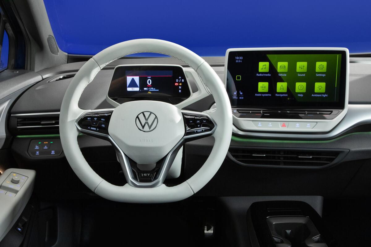 The Volkswagen ID.4's white dashboard and steering wheel