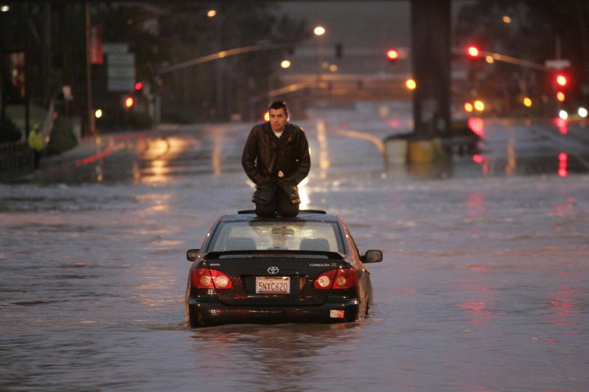 Photos: San Diego River floods in Mission Valley - The San Diego  Union-Tribune