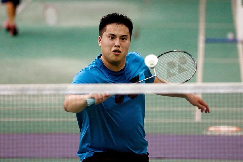 Phillip Chew practices at the Orange County Badminton Club on July 21.