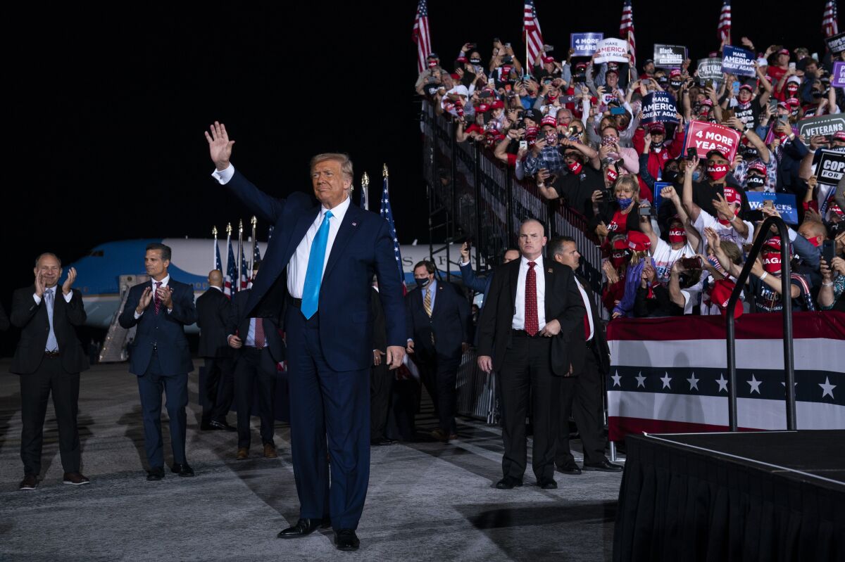 President Donald Trump arrives for a campaign rally at Harrisburg International Airport, Saturday, Sept. 26, 2020, in Middletown, Pa. (AP Photo/Evan Vucci)