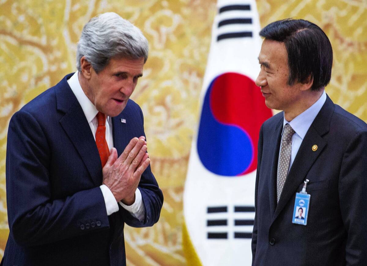 U.S. Secretary of State John F. Kerry greets his South Korean counterpart, Yun Byung-se, in Seoul. Kerry later traveled to Beijing. Both visits are focused on how to respond to North Korea's recent threats.