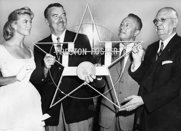 From left, actress Dorothy Malone, Preston Foster and Harry Sugarman of the improvement association and builder C.E. Toberman, display a star for Hollywood's three-mile Walk of Fame on Aug. 15, 1958. See more stars on the Hollywood Star Walk, the Los Angeles Times' virtual tour of the streets of Hollywood.