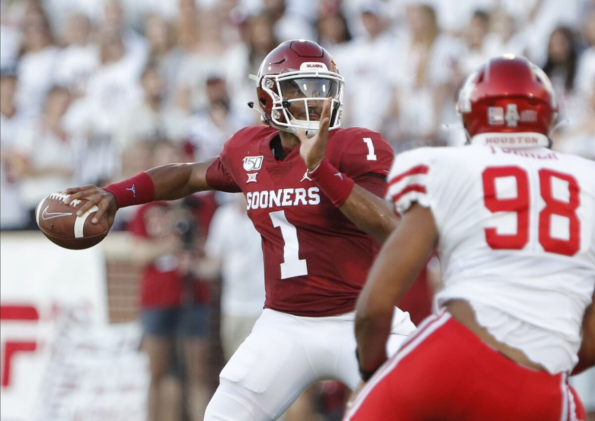 Oklahoma quarterback Jalen Hurts prepares to pass against Houston during the first half Sunday.
