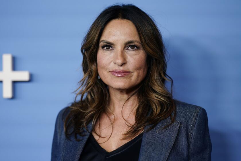 Mariska Hargitay poses in a denim blazer at the 2022 premiere of Apple TV+ series "Gutsy" in New York