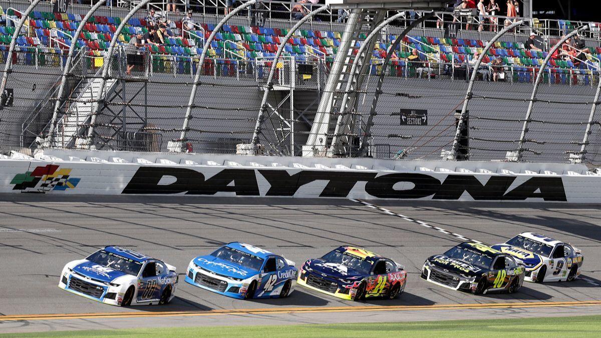 Drivers, from left, Alex Bowman (88), Kyle Larson (42), William Byron (24), Jimmie Johnson (48) and Chase Elliott (9) run laps during a practice session for the NASCAR Daytona 500 on Friday.