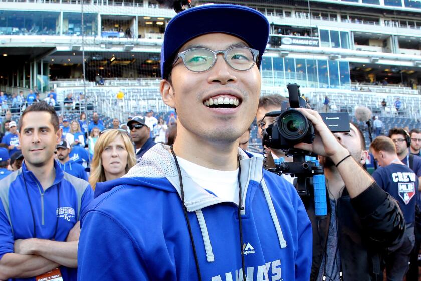 Kansas City Royals superfan SungWoo Lee traveled from South Korea to watch his favorite team play in the World Series.