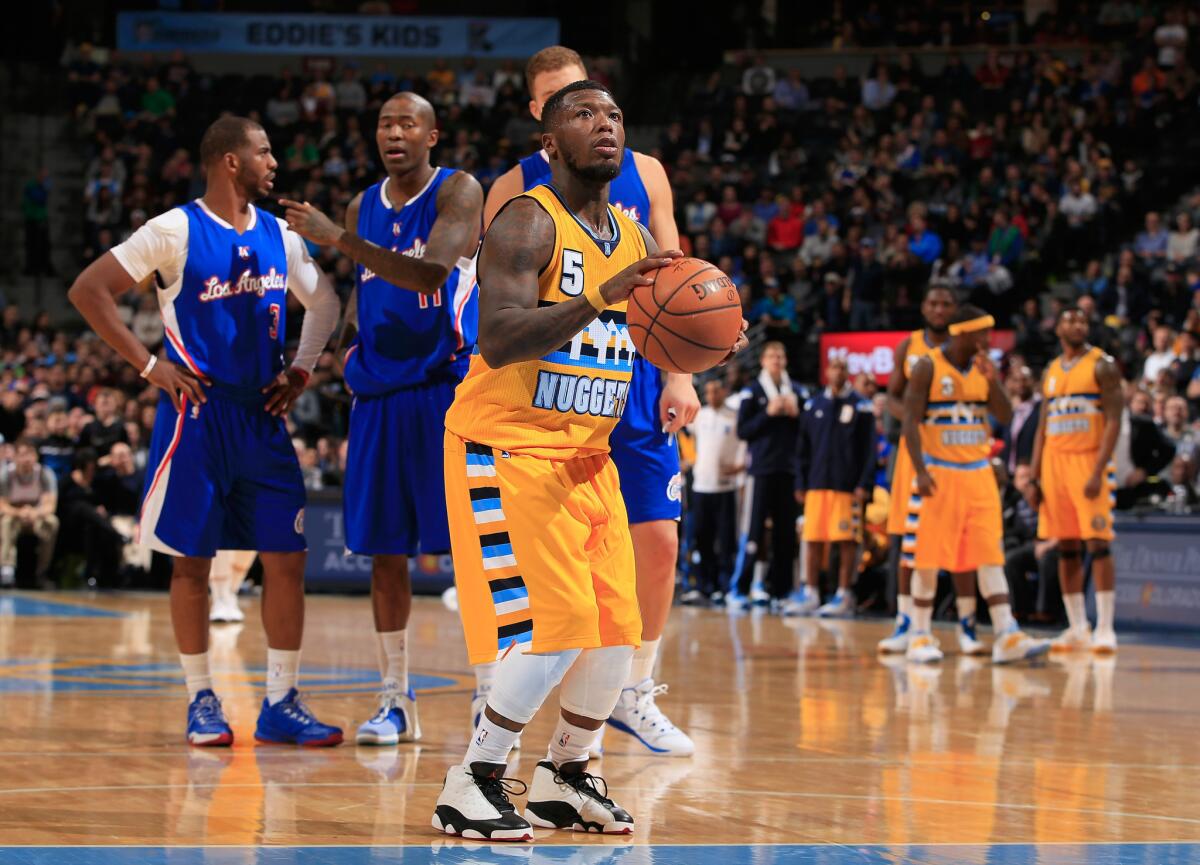 Nuggets guard Nate Robinson was traded to Boston for Jameer Nelson on Tuesday.