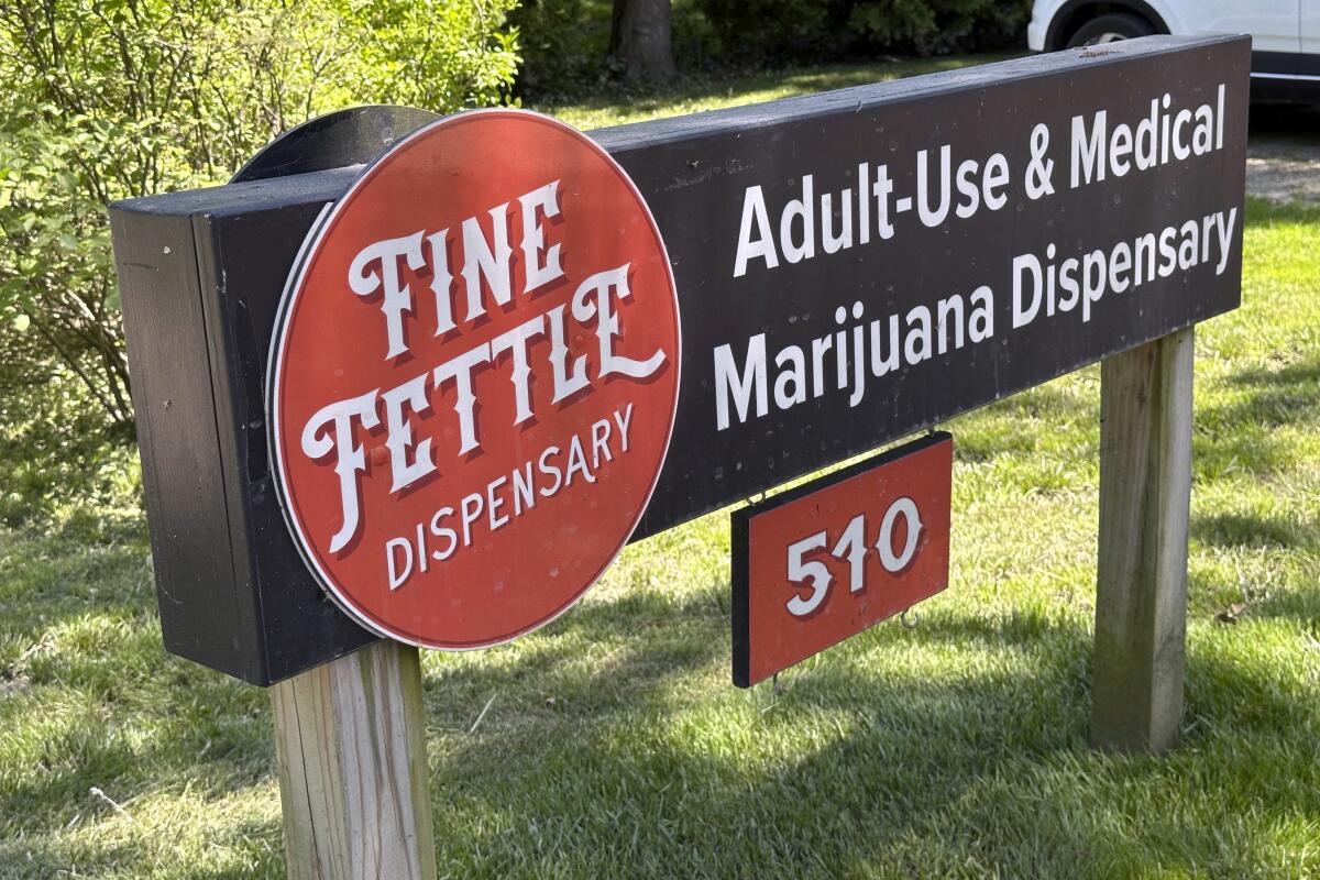 A sign advertises the Fine Fettle cannabis dispensary in West Tisbury, Mass.