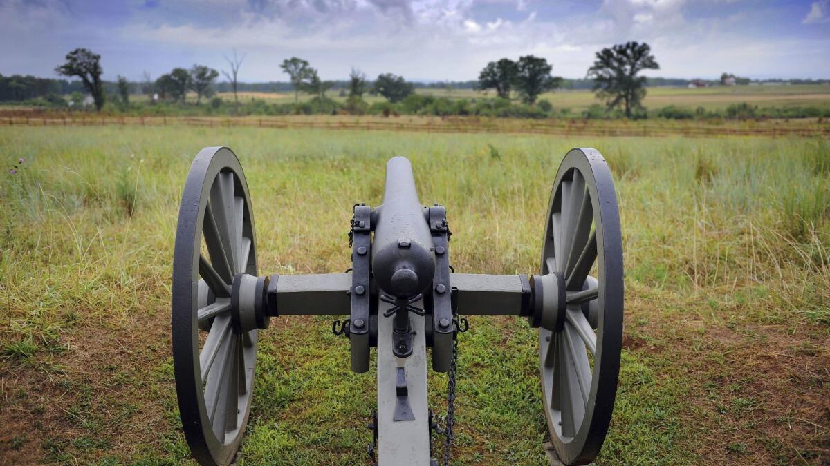 A restored canon sits along Cemetery Ridge in Gettysburg, Pa., site of the bloodiest battle of the U.S. Civil War.