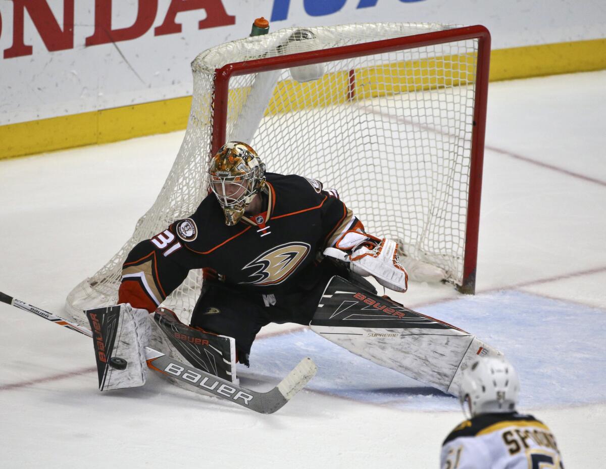 Ducks goalie Frederik Andersen blocks a Boston Bruins' shot on March 18.