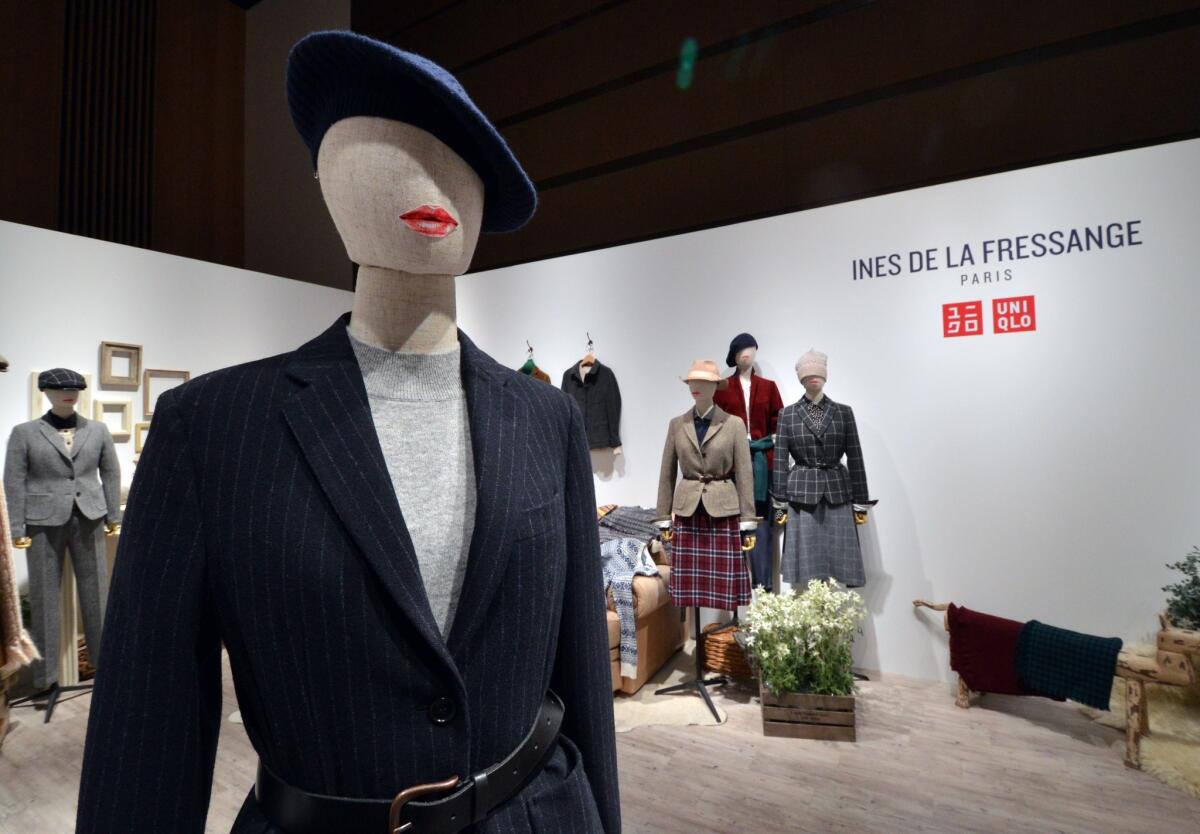Japanese fashion giant Uniqlo's fall and winter 2015 collection, inspired by French fashion icon Ines de la Fressange, on display in Tokyo. Uniqlo is to open at Los Cerritos Center this week.