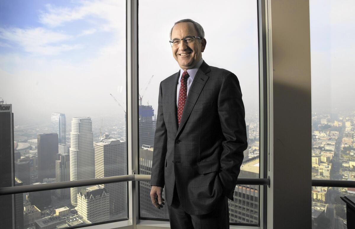 Lloyd Greif, shown in his 65th-floor office in downtown L.A., is founder and CEO of the investment banking firm Greif & Co. “I wasn’t born with a silver spoon in my mouth,” he says. “I grew up in a one-bedroom apartment.”