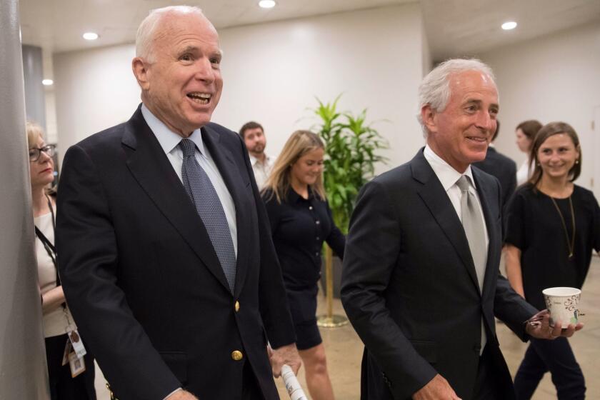 FILE - In this Thursday, July 13, 2017 file photo, Senate Armed Services Committee Chairman John McCain, R-Ariz., left, and Sen. Bob Corker, R-Tenn., chairman of the Senate Foreign Relations Committee, head to the Senate for a meeting on the revised Republican health care bill in Washington. In a surprise announcement, Corker said Tuesday, Sept. 26, 2017, he will not seek re-election in 2018. (AP Photo/J. Scott Applewhite, file)
