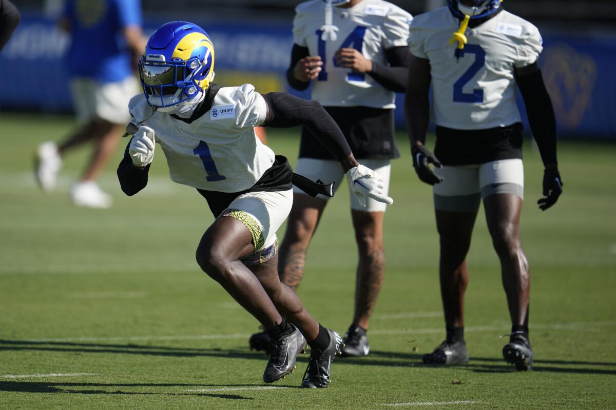 Rams cornerback Derion Kendrick runs a drill at training camp in July.