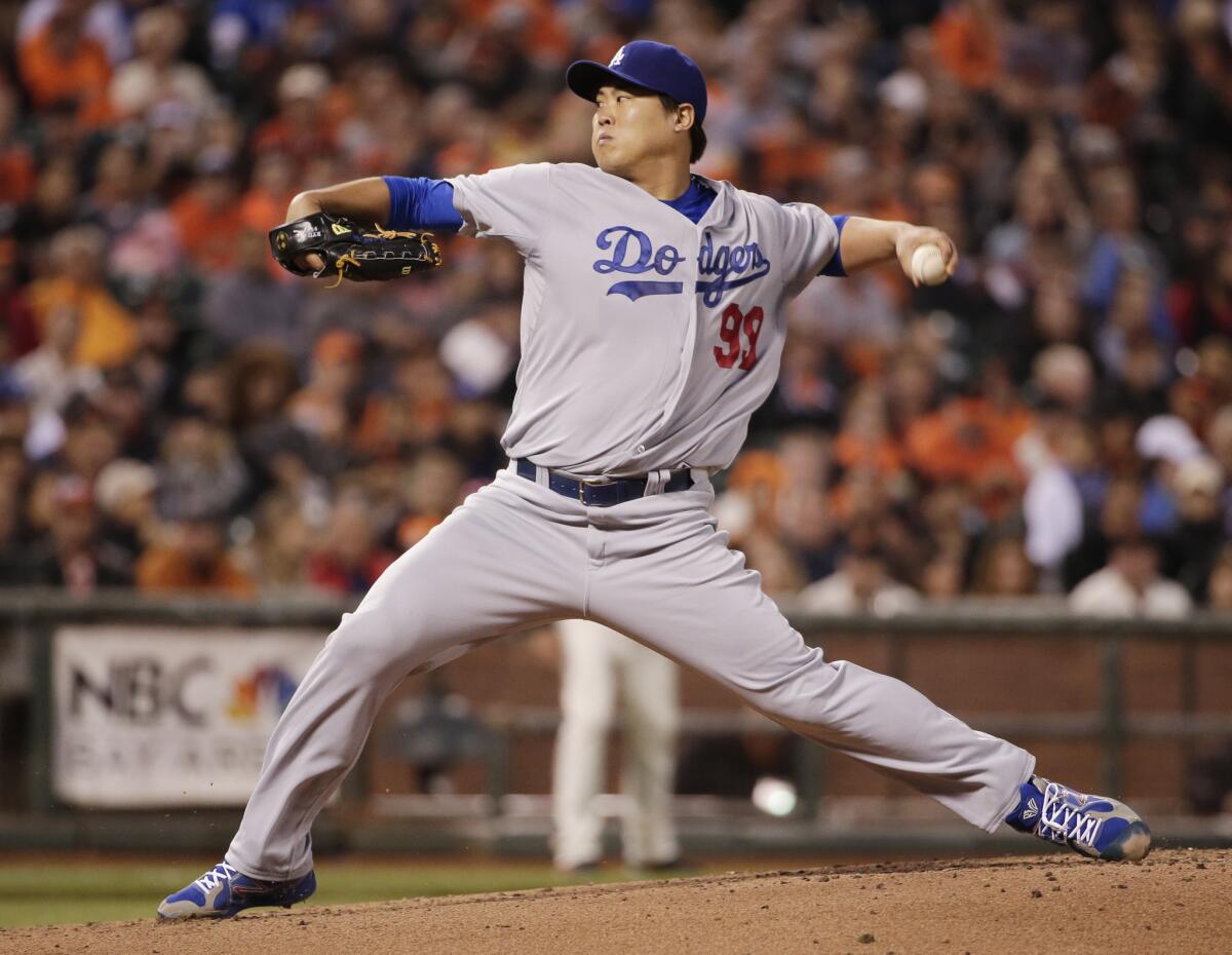 Hyun-Jin Ryu throws against the Giants during a Sept. 12 game in San Francisco.