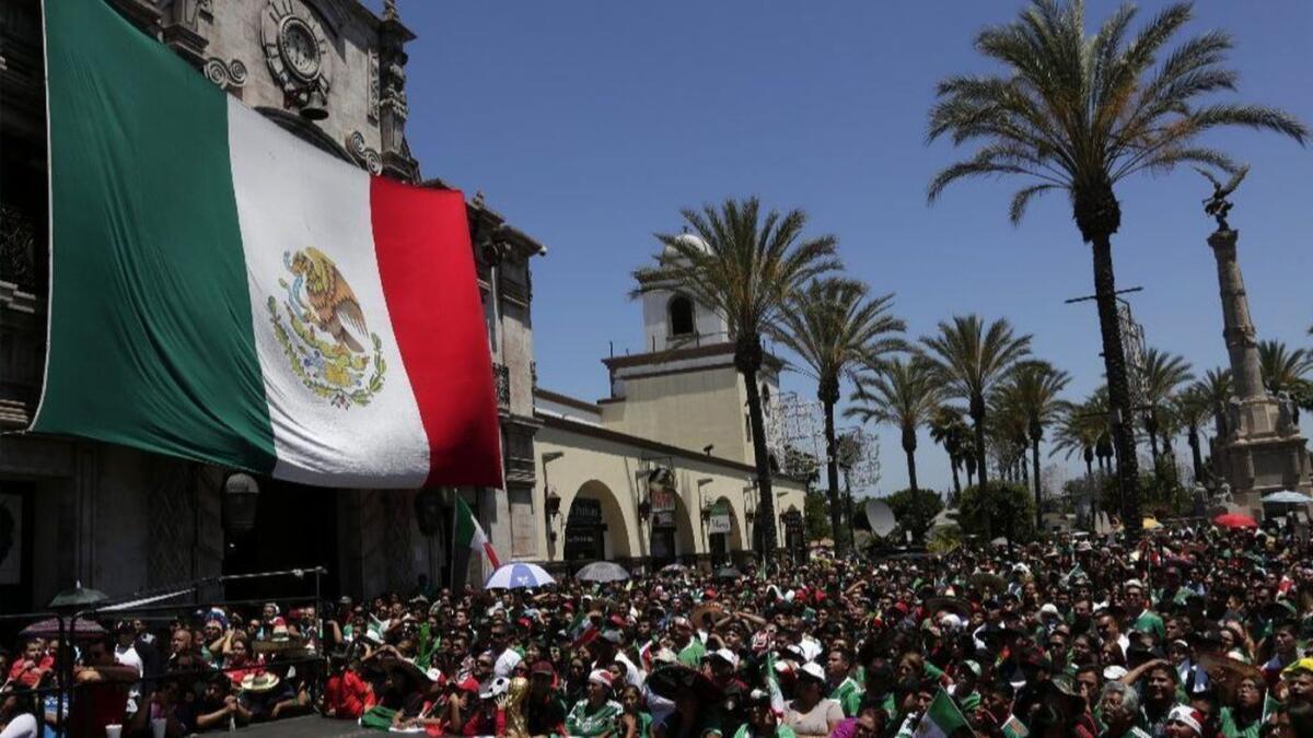 Hundreds gathered at Plaza Mexico in Lynwood to watch the telecast as Mexico met Brazil in the World Cup on June 17, 2014.