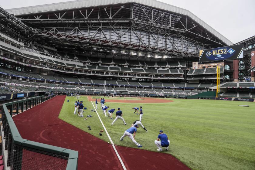 Arlington, Texas, Saturday, October 17, 2020. Dodgers warm up before game six of the NLCS at Globe Life Field. (Robert Gauthier/ Los Angeles Times)