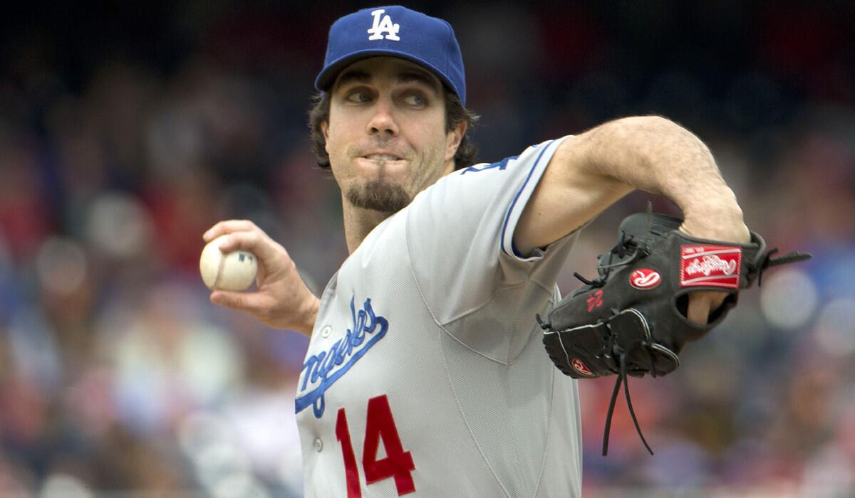 Dodgers starting pitcher Dan Haren went six inning against the Nationals on Wednesday, giving up seven hits and three earned runs, including two in the first.
