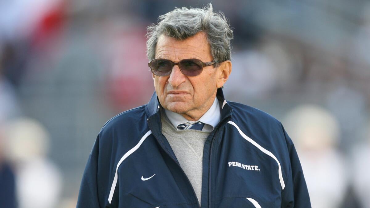 Penn State football coach Joe Paterno looks on before a game against Ohio State in November 2009.