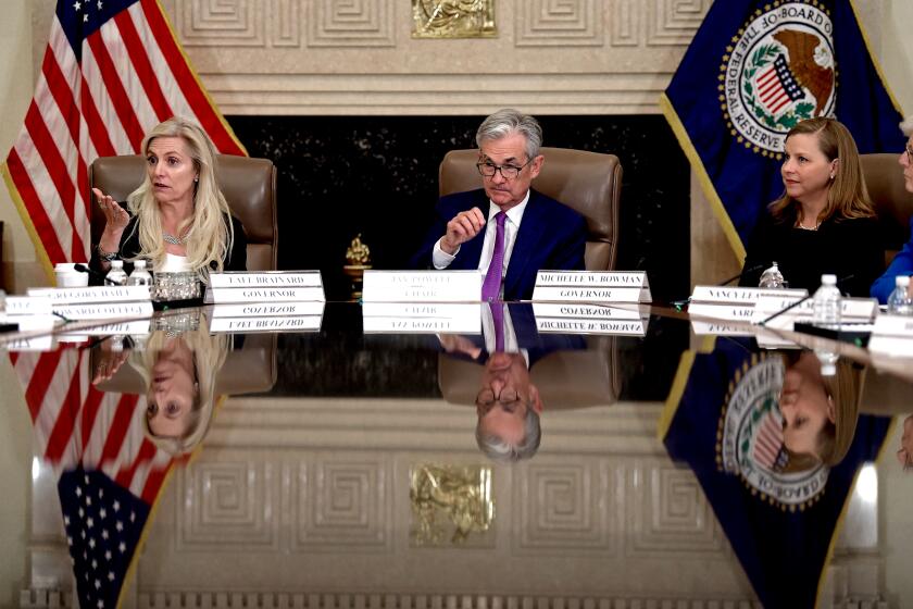 US Federal Reserve Chair Jerome Powell (C) flanked by Federal Reserve Governors Lael Brainard (L) and Michelle Bowman (R) attends a "Fed Listens" event at the Federal Reserve headquarters in Washington, DC, on October 4, 2019. (Photo by Eric BARADAT / AFP) (Photo by ERIC BARADAT/AFP via Getty Images)