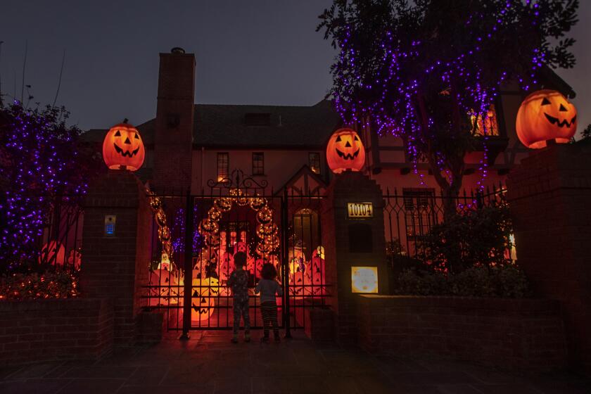 TOLUCA LAKE, CA - OCTOBER 28, 2021: Jack-o'-lanterns are the theme at a home decorated for Halloween on Moorpark St. in Toluca Lake. (Mel Melcon / Los Angeles Times)