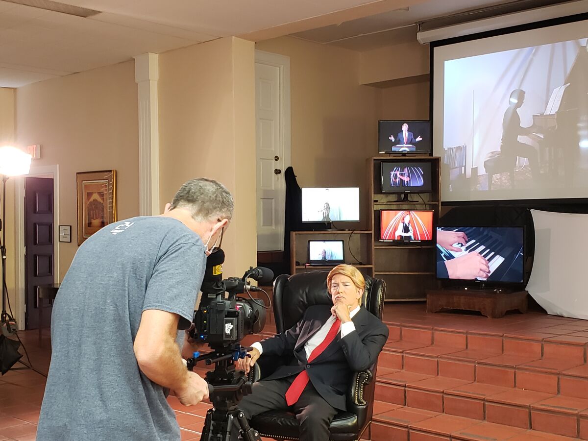 Donnie Eastman turns the camera on Walter DuMelle as President Trump for a filmed presentation of "8 Songs for a Mad King."