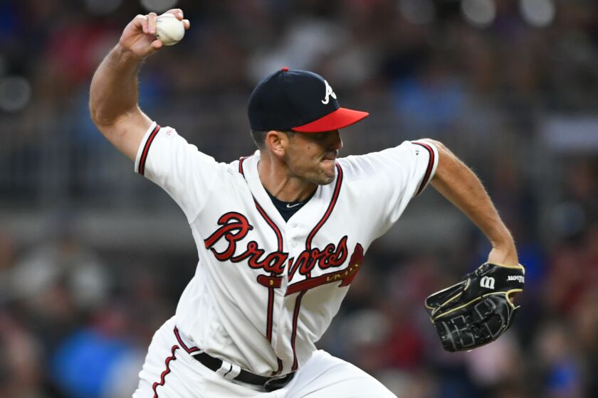Atlanta Braves pitcher Darren O'Day works against the San Francisco Giants during a baseball game, Sept. 21, 2019, in Atlanta. O'Day announced Monday, Jan. 30, 2023 he is retiring after 15 seasons for six teams in the major leagues. (AP Photo/John Amis, file)