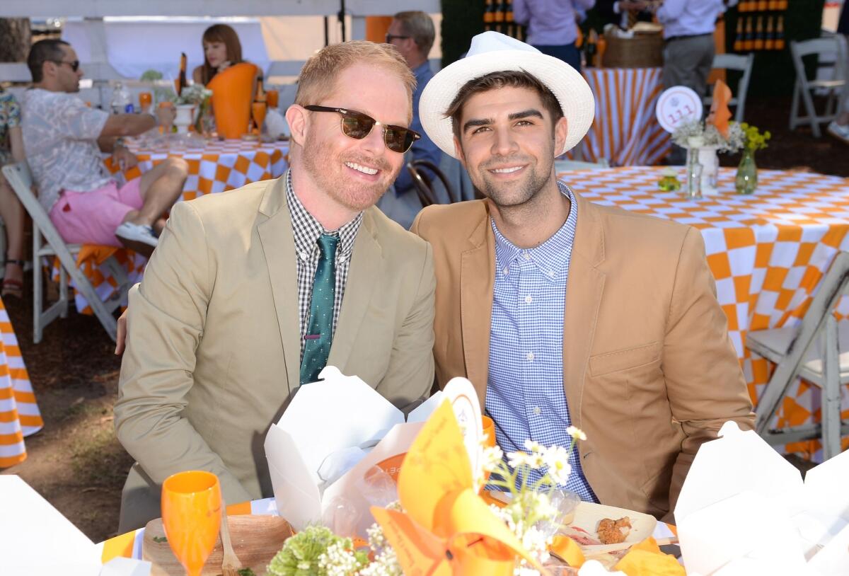 Actor Jesse Tyler Ferguson, left and Justin Mikita attend The Fourth-Annual Veuve Clicquot Polo Classic, Los Angeles at Will Rogers State Historic Park on October 5, 2013