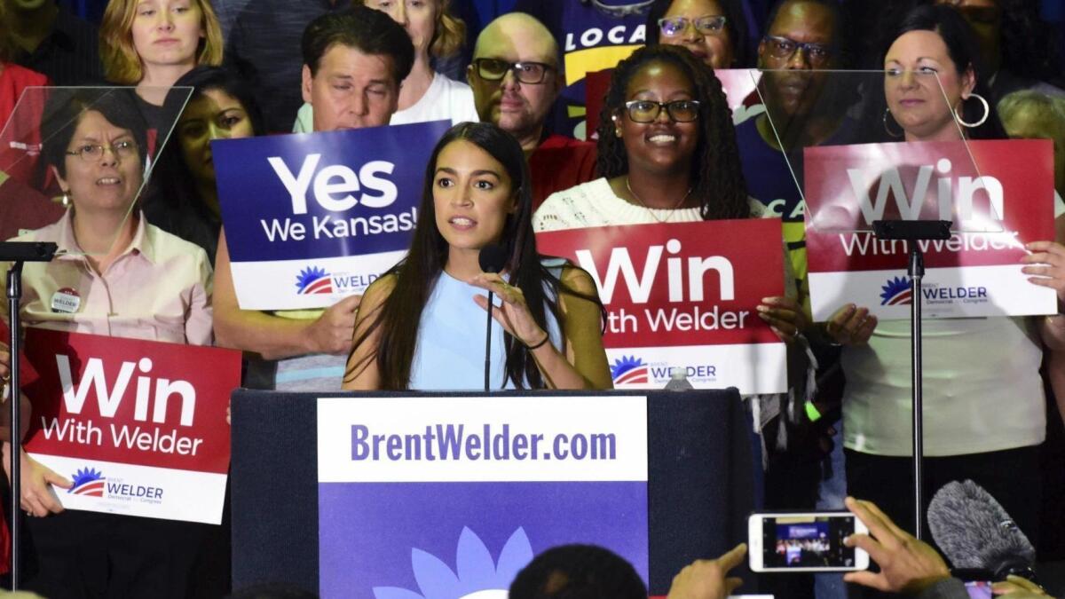 New York congressional candidate Alexandra Ocasio-Cortez speaks in support of Kansas Democrat Brent Welder in Kansas City, Kan., on July 20.