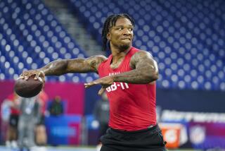 Florida quarterback Anthony Richardson runs a drill at the NFL football scouting combine.