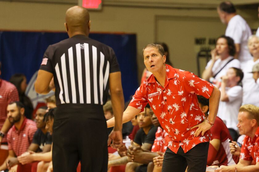 LAHAINA, HI - NOVEMBER 23: Head coach Eric Musselman of the Arkansas Razorbacks questions an official after a call in the first half of the game against the San Diego State Aztecs during the Maui Invitational at Lahaina Civic Center on November 23, 2022 in Lahaina, Hawaii. (Photo by Darryl Oumi/Getty Images)