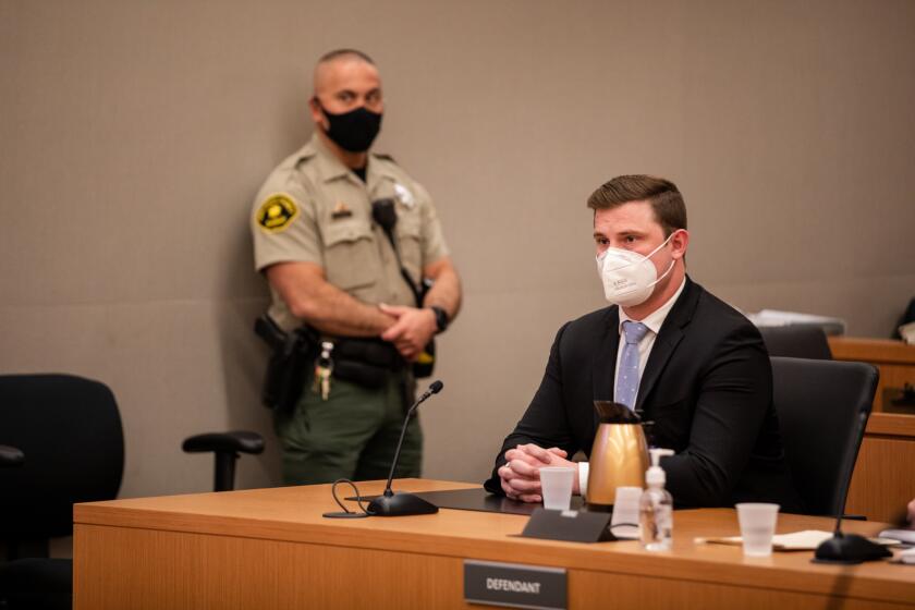 Former sheriff’s deputy Aaron Russell, 25, during his hearing at the downtown Superior Court in San Diego on Monday, Feb. 7, 2022. Russell was sentenced to one year in jail and three years of probation for voluntary manslaughter in the death of Nicholas Bils, a suspect fleeing outside downtown jail on May 1, 2020.