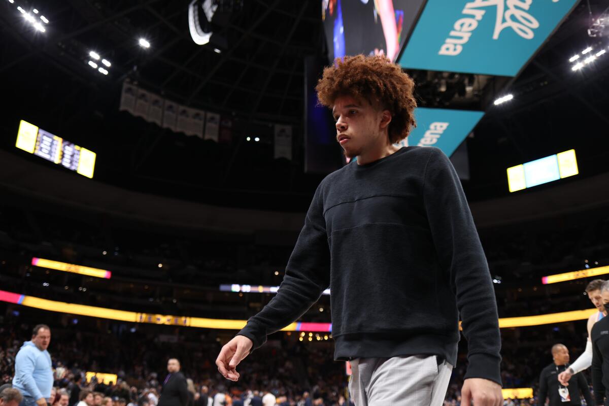 Clippers guard Jason Preston walks off the court at Ball Arena in Denver.