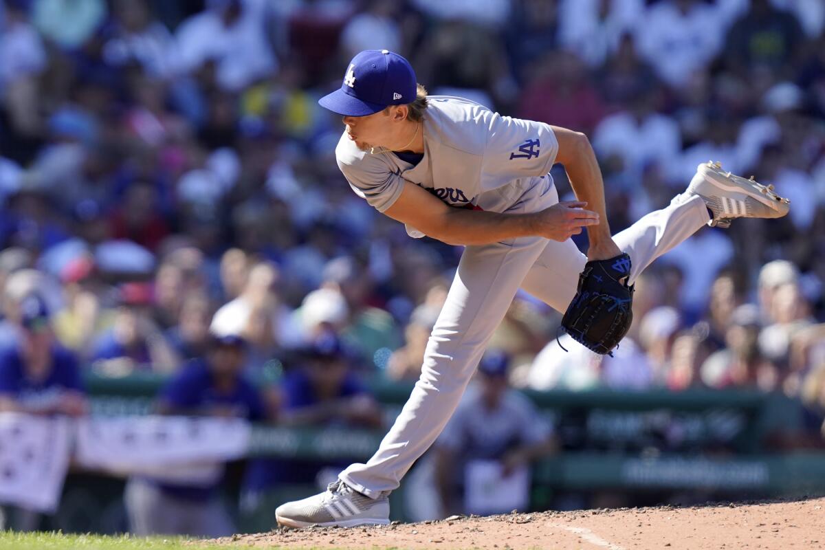 Dodgers pitcher Gavin Stone delivers against the Red Sox at Fenway Park.