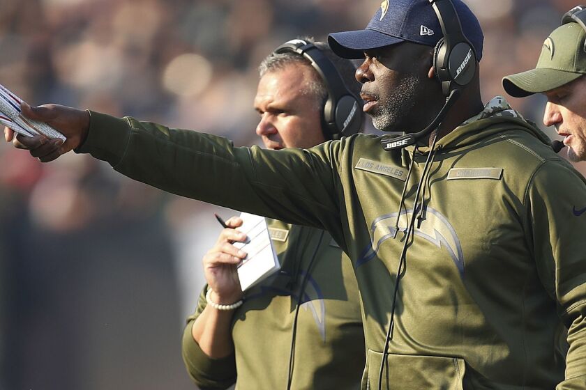 Los Angeles Chargers head coach Anthony Lynn gestures during the first half of an NFL football game against the Oakland Raiders in Oakland, Calif., Sunday, Nov. 11, 2018. (AP Photo/Ben Margot)