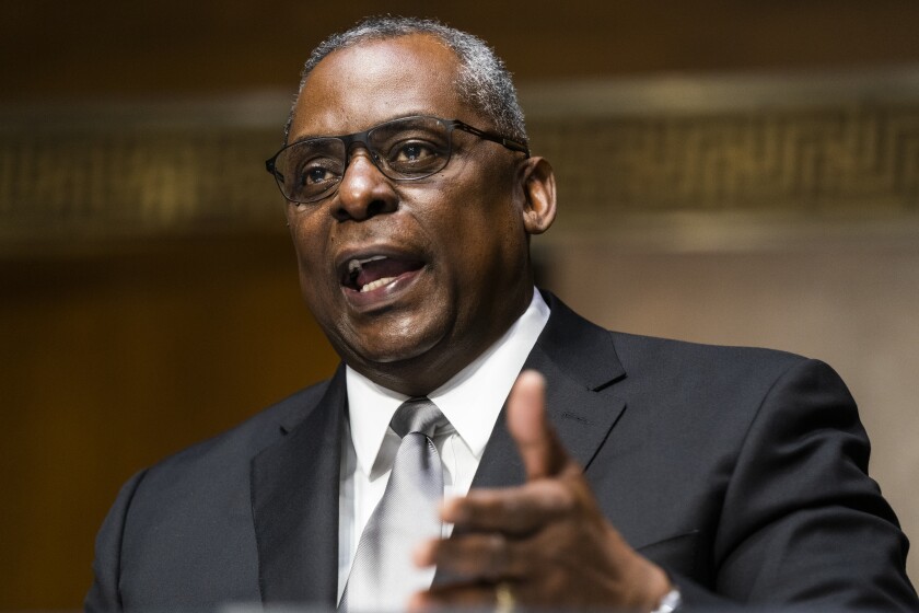 Secretary of Defense nominee Lloyd Austin, a recently retired Army general, speaks during his conformation hearing.