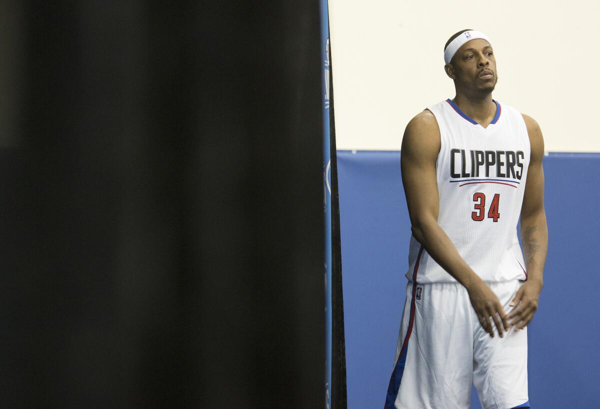 Clippers forward Paul Pierce waits to take the stage for questions at media day.