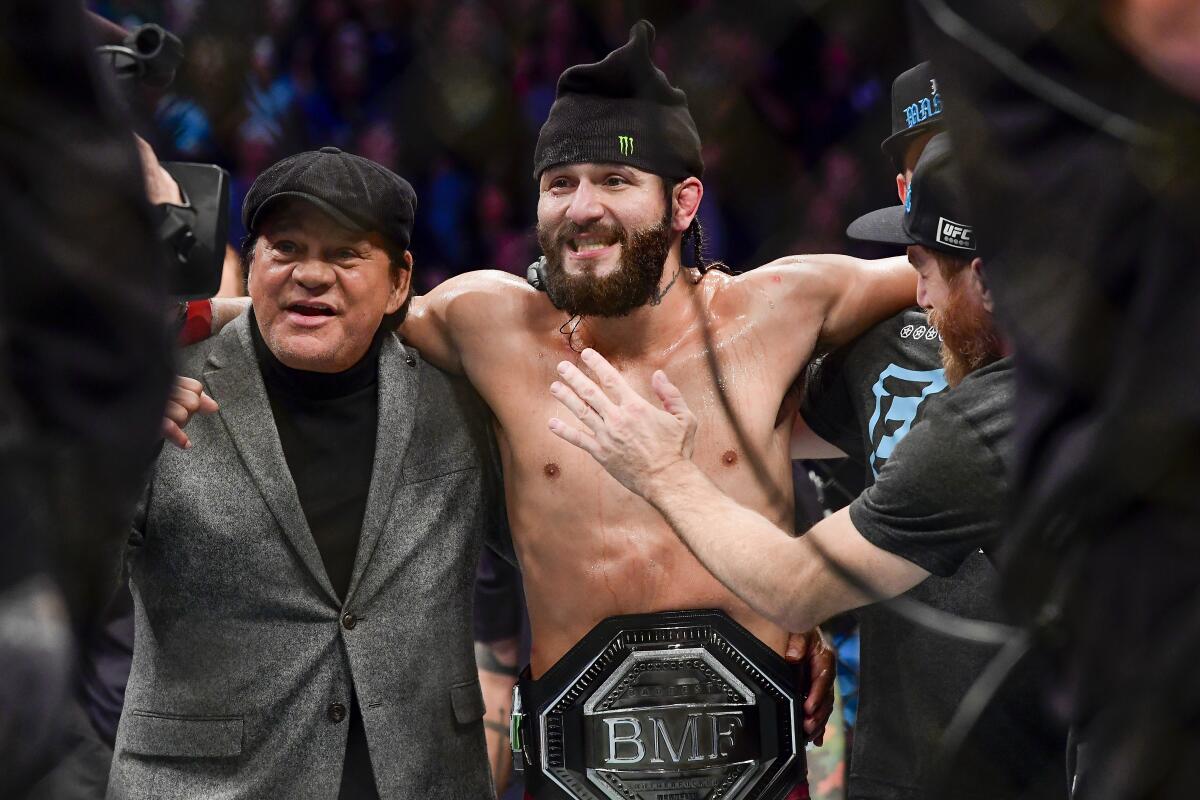 Jorge Masvidal is awarded victory by TKO on a medical stoppage against Nate Diaz in the welterweight "BMF" championship bout during UFC 244 on Saturday.