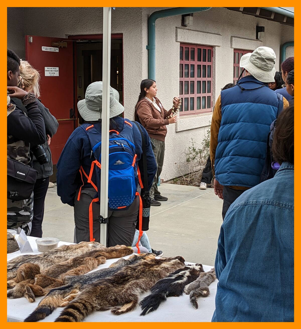 Kenia Estrella talks to a group of visitors at Eaton Canyon.