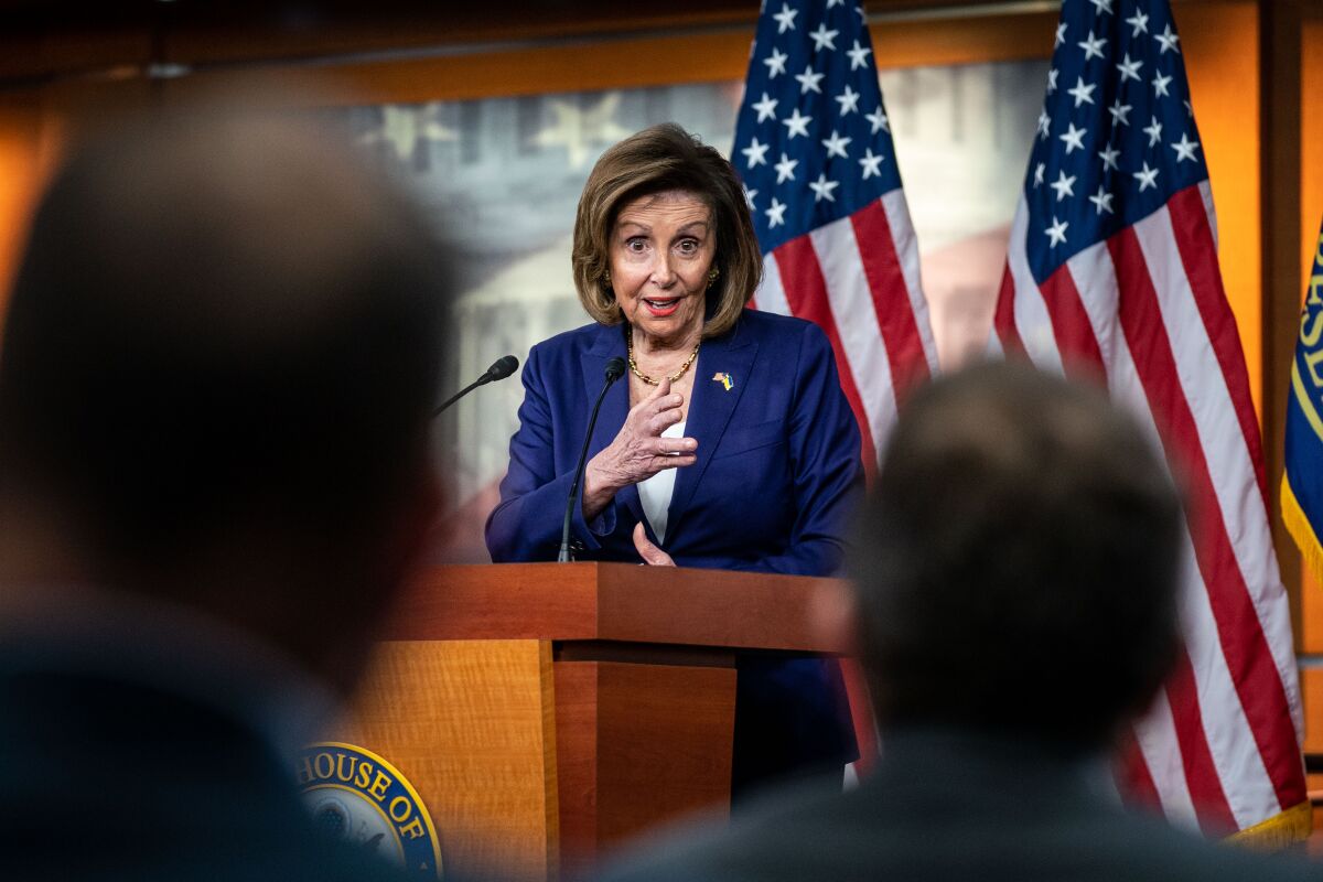 Nancy Pelosi speaks at a news conference 