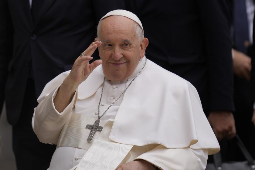 Pope Francis arrives as he meets poor people and refugees in St. Elizabeth of Hungary Church in Budapest, Hungary, Saturday, April 29, 2023. The Pontiff is in Hungary for a three-day pastoral visit. (AP Photo/Darko Vojinovic)