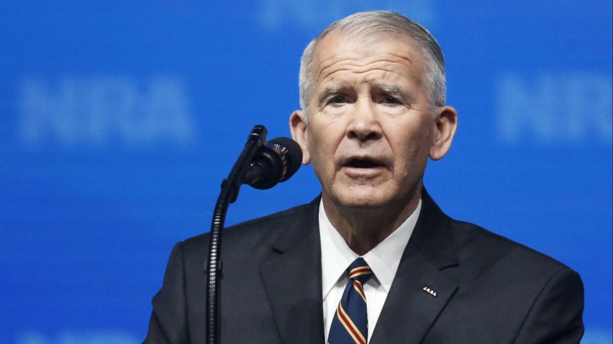 Former Marine Lt. Col. Oliver North speaks before giving the invocation at the National Rifle Assn. convention last week in Dallas.
