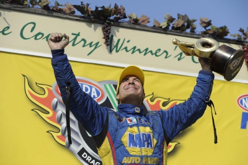 Ron Capps celebrates a victory at Sonoma Raceway on July 28.